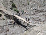 Crossing the wooden bridge over Avalanche River